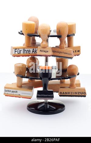 Stamp holder with many wooden stamps as a symbol of bureaucracy Stock Photo  - Alamy