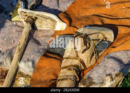 Flint ax and a bone club reconstruction from the Stone Age Stock Photo
