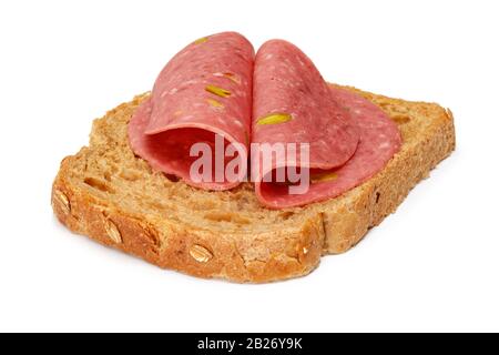 Salami slices and bread slice isolated on white background Stock Photo