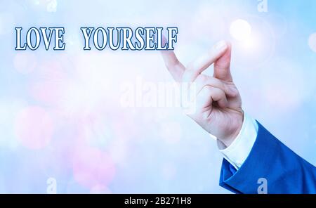 Writing note showing Love Yourself. Business concept for have selfrespect and the unconditional selfacceptance Stock Photo