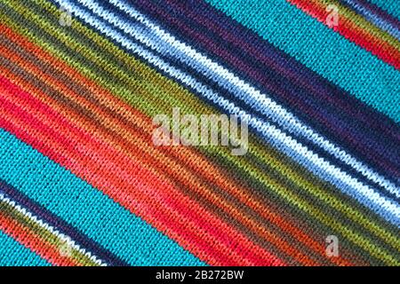 Texture of Colorful Striped Alpaca Knitted Wool Fabric in Diagonal Patterns Stock Photo