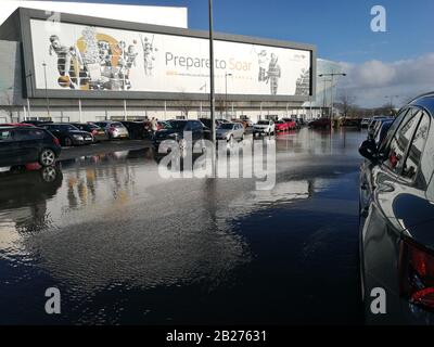 Glasgow, UK. 1st Mar, 2020. Roads and car parks struggle to cope with amount of rainfall in recent days in Scotland. Car park in Breahead Soar shopping and entertainment centre flooded following a heavy rain, Glasgow, UK Credit: Alamy News/Pawel Pietraszewski Credit: Pawel Pietraszewski/Alamy Live News Stock Photo