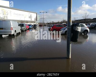 Glasgow, UK. 1st Mar, 2020. Roads and car parks struggle to cope with amount of rainfall in recent days in Scotland. Car park in Breahead Soar shopping and entertainment centre flooded following a heavy rain, Glasgow, UK Credit: Alamy News/Pawel Pietraszewski Credit: Pawel Pietraszewski/Alamy Live News Stock Photo