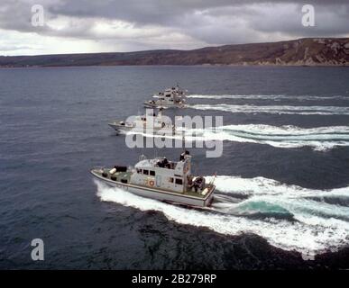 HMS Pursuer and other P2000 Archer class patrol boats in the English Channel in the early 1990s Stock Photo