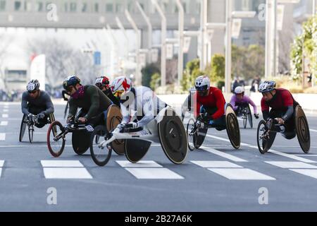 Tokyo, Japan. 1st Mar, 2020. Elite wheelchair athletes race during the Tokyo Marathon 2020. This year, only elite runners and elite wheelchair athletes took part in the annual event because of the new coronavirus (COVID-19) spread in Japan. Credit: Rodrigo Reyes Marin/ZUMA Wire/Alamy Live News Stock Photo