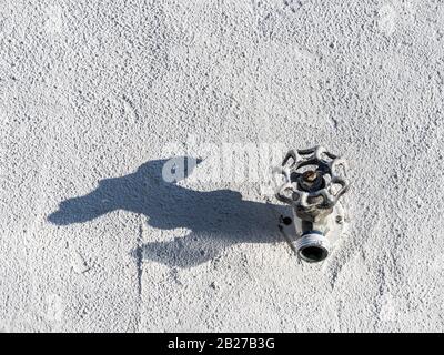 Old outdoor spigot faucet Stock Photo