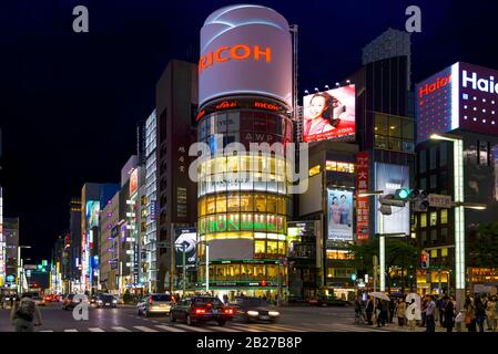 Tokyo, Japan - April 20, 2014: View of Ginza district at night. Ginza is an area of Tokyo with numerous stores, boutiques, restaurants. Stock Photo