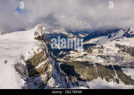 Fantastically beautiful snow landscape in the mountains - aerial flight footage