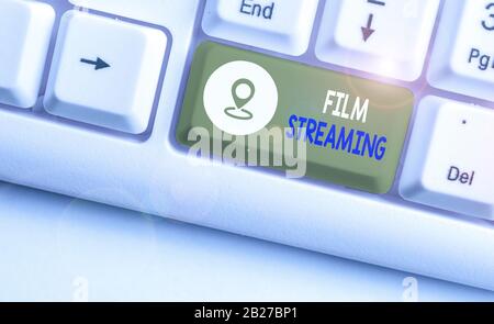 Handwriting text Film Streaming. Conceptual photo act of watching sound or video directly from the internet Stock Photo