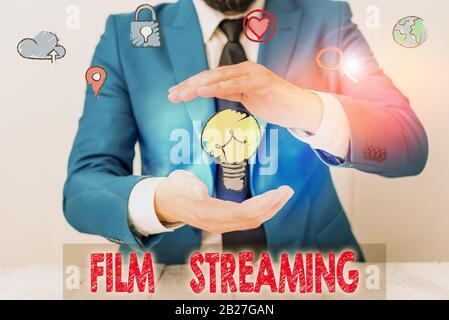 Handwriting text writing Film Streaming. Conceptual photo act of watching sound or video directly from the internet Stock Photo