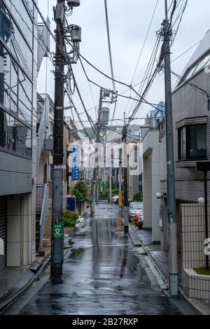 Deserted alley on a rainy day in Tokyo, Japan. Stock Photo