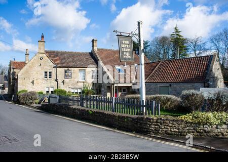 The seven stars pub freehouse in the village of Winsley in Wiltshire on a sunny late winter day Stock Photo