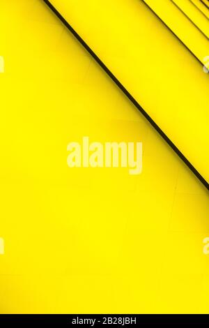 Yellow abstract background with dark diagonal lines. Fondation Louis Vuitton,  Paris, France, July 2019. Beautiful design, colorful vertical shot Stock  Photo - Alamy