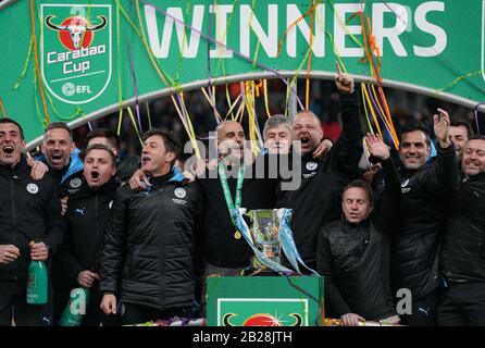 Birmingham, UK. 01st Mar, 2020. Man City Manager Josep 'PEP' Guardiola and his team celebrate with his coaching staff during the Carabao Cup Final match between Aston Villa and Manchester City at Wembley Stadium, London, England on 1 March 2020. Photo by Andy Rowland. Credit: PRiME Media Images/Alamy Live News Stock Photo