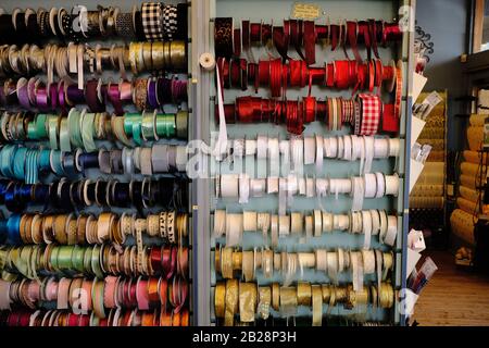 Wall of colourful ribbon spools at the local card shop, Ottawa, Ontario, Canada. Stock Photo