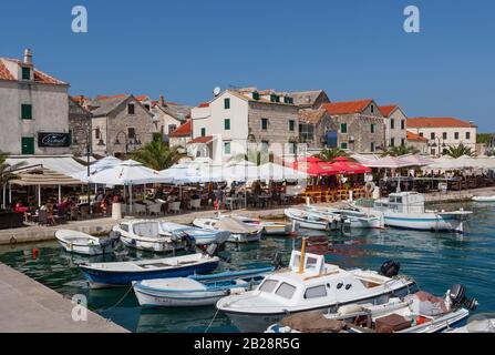 Promenade with fishing boats in the port, Primosten, Croatian Adriatic coast, Central Dalmatia, Dalmatia, Croatia Stock Photo