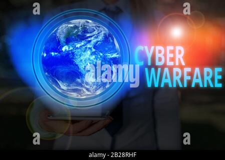 Handwriting text writing Cyber Warfare. Conceptual photo activity of using the internet to attack a country computers Elements of this image furnished Stock Photo