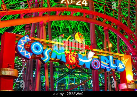 Yokohama, Japan - April 21, 2017: closeup of entrance and signboard of Cosmo World amusement park in Minato Mirai 21 district of Yokohama with Cosmo Stock Photo