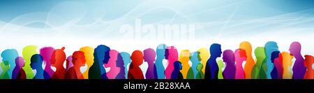 Group of different people. Crowd of ethnic people standing together. Diversity of people. Community. Colored silhouette profiles with world map Stock Photo