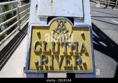 Nameplate on the new Alexandra Bridge over the Clutha River taking NZ State Highway 8 over the river. The bridge was opened in July 1958. Stock Photo