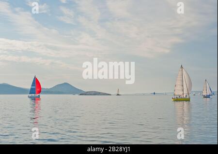Yachts, Mediterranian sea, sailboat, in the sunlight, luxury watersport, amazing vacation adventures Stock Photo