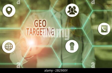 Handwriting text Geo Targeting. Conceptual photo method of determining the geolocation of a website visitor Stock Photo