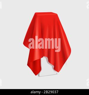 Cube or box covered with red silk cloth isolated on white background.  Secret gift, hidden under