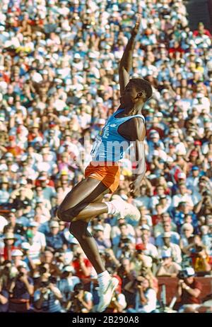 Carl Lewis competing the long jump at the 1984 US Olympic Track and Field Team Trials. Stock Photo