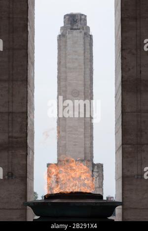 Tower of the National Flag Memorial and the votive flame of the Triumphal Propylaeum, in Rosario, Argentina Stock Photo