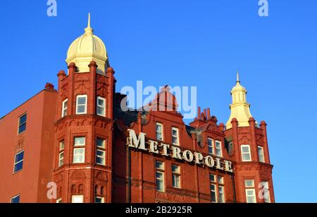 Exterior of the Britannia Metropole Hotel on the promenade at Blackpool, Lancashire, England, against a blue sky Stock Photo