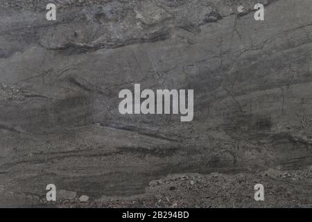 A weathered grey marble background textured taken from above. Stock Photo