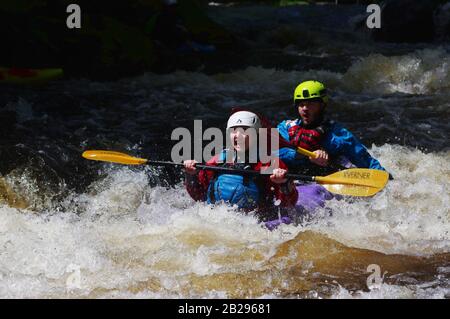 Whitewater playboaters June 2019 Stock Photo