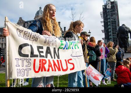 Student activists w/ banners at the Youth Strike For Climate demonstration, London, in protest of the government's lack of action on Climate Change. Stock Photo