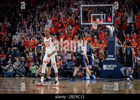 Charlottesville, VA, USA. 29th Feb, 2020. Virginia fans celebrate during the NCAA Basketball game between the Duke University Blue Devils and University of Virginia Cavaliers at John Paul Jones Arena in Charlottesville, VA. Brian McWalters/CSM/Alamy Live News Stock Photo