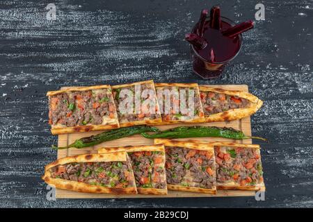 Traditional Turkish dish pita beef - Kusbasili Pide. Turkish Pide with Cube. takeaway concept Stock Photo