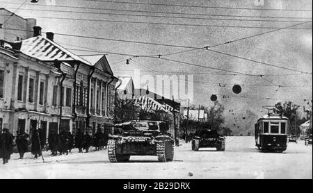 German troops on Sovetskaya Street in Tver. This historical block was soon destroyed, with only one structure still standing. October 1941 Stock Photo
