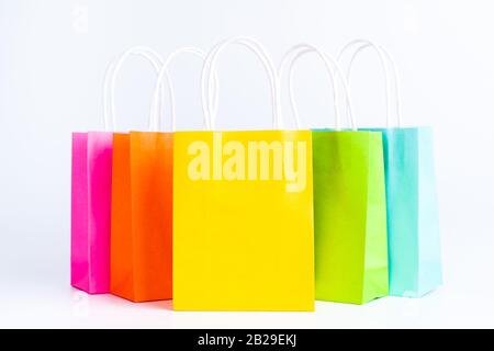 Colorful shopping bags standing in a row Stock Photo