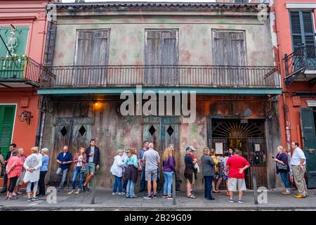 People waiting in line outside Preservation Hall jazz music venue, New Orleans, Louisiana, USA Stock Photo