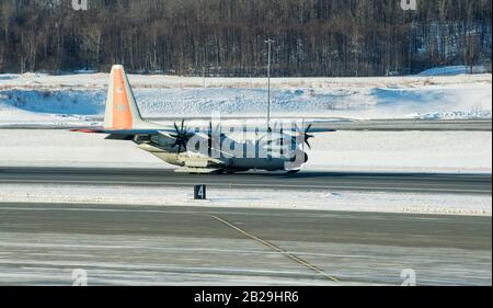 A New York Air National Guard LC-130 'Skibird' assigned to the 109th Airlift Wing, decelerate its speed on the flight line Feb. 28, 2020, at Joint Base Elmendorf-Richardson, Alaska, in support of U.S. Northern Command's Exercise Arctic Edge 2020. Arctic Edge is a biennial homeland defense exercise designed to provide high quality and effective training in the extreme cold-weather conditions found in Arctic environments. (U.S. Air Force photo by Senior Airman Xavier Navarro) Stock Photo