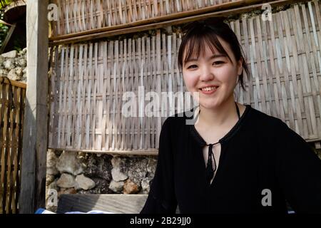 A beautiful woman smiling at the camera Stock Photo