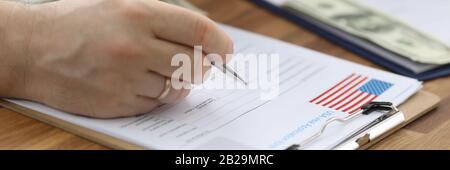 Clipboard with important papers Stock Photo