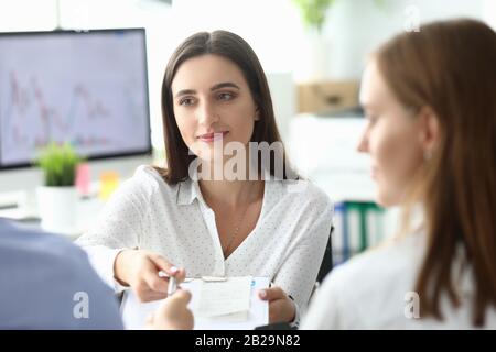 Smart woman at negotiations Stock Photo