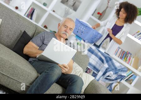 old man using laptop Stock Photo
