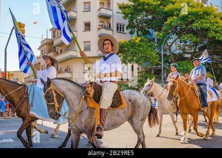 MONTEVIDEO, URUGUAY, MARCH - 2020 - Country uruguayan people on horseback at assumption parade of Lacalle Pou Herrera as new president of uruguayan re Stock Photo