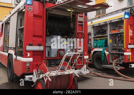 View of the two fire trucks arrived at the scene of the fire Stock Photo