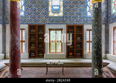 Ornate ceramic wall tiles and stained glass windows at the Topkapi Palace Museum, Istanbul, Turkey Stock Photo