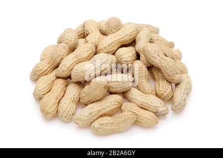 Peanuts. Unpeeled nuts isolated on white background Stock Photo