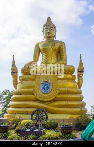 Statue of a golden Buddha with serpents, Thailand Stock Photo