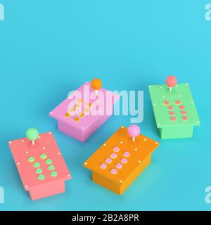 Four colorful retro arcade game controllers on bright blue background in pastel colors. Minimalism concept. 3d render Stock Photo