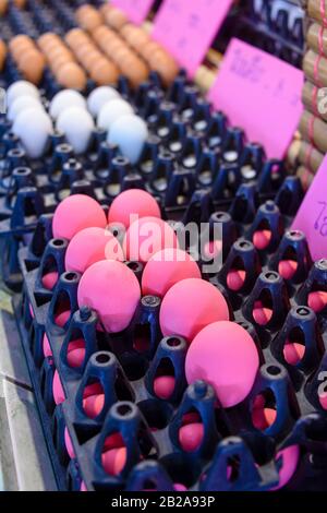 Pink century eggs on sale in the traditional Mae Somchit Kata Fresh Market, Kata, Phuket, Thailand Stock Photo